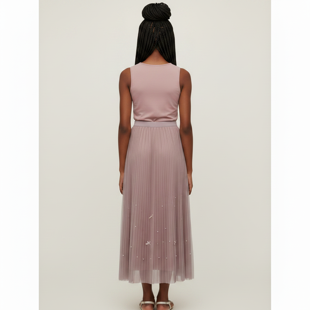 Nigerian girl wearing dusty mauve bow pleated midi skirt - back view