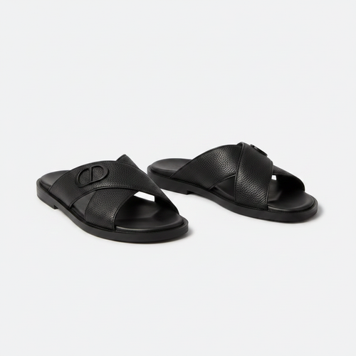 Men's black pebbled leather cross-strap slides – pair shot on white background