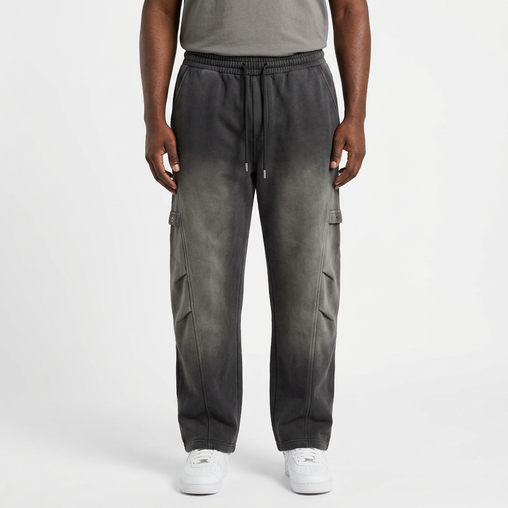 Adult Black model wearing grey cargo-pocket drawstring joggers