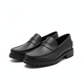 Pair of black leather penny loafers with chunky lug sole on a white background