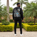 Nigerian male model wearing black sweatshirt with large back cyclist graphic