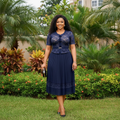 Women's Navy Blue Lace Overlay Peplum Pleated Midi Gown - Nigerian Female Model