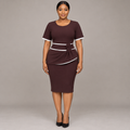 Black Nigerian woman wearing dark brown white-piped wrap peplum dress