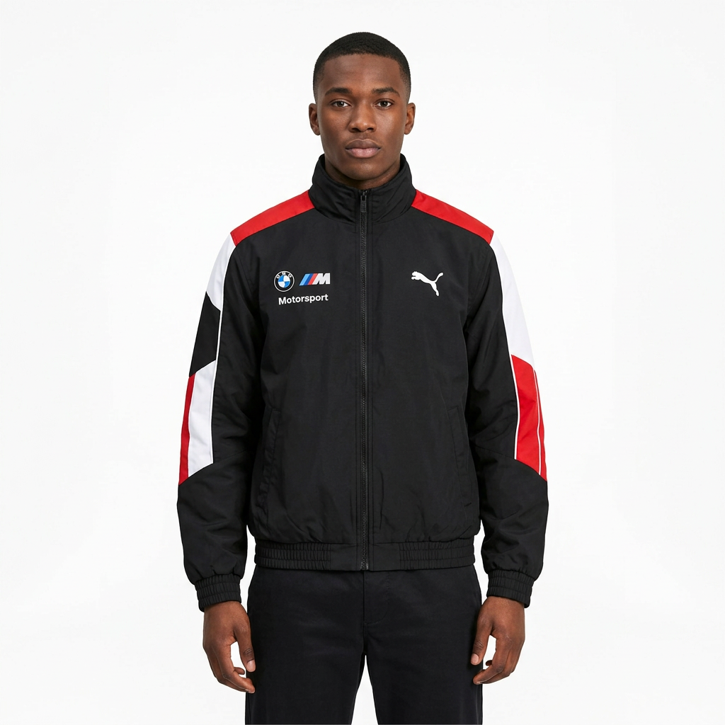 Male model wearing black colour-block zip jacket with red and white sleeve accents