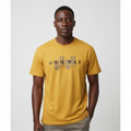 Model wearing the mustard yellow layered text graphic t-shirt