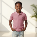 Nigerian boy model wearing pink polo shirt
