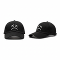 Black dad cap with white XX dead eyes frown embroidery – ghost mannequin front and side view