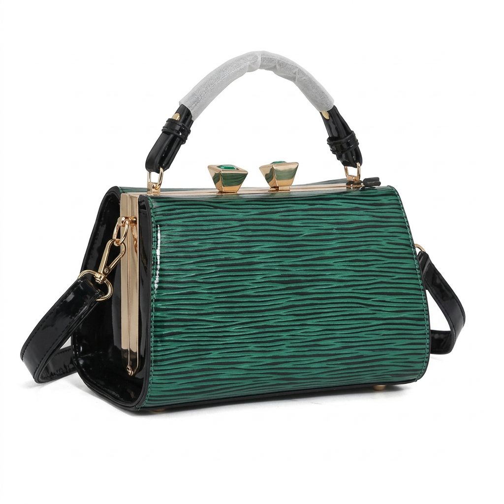 Emerald ripple-textured frame handbag with black trim and gold-tone twin clasp on white