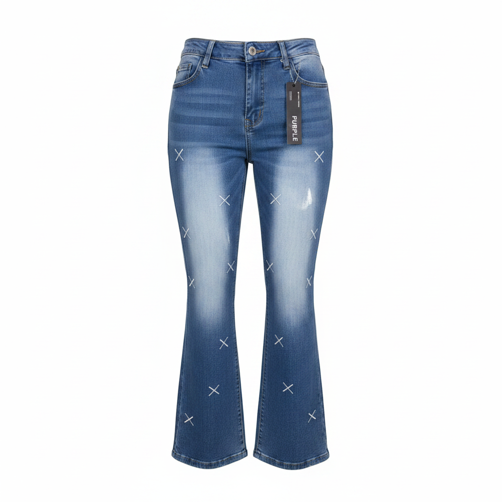 Ghost mannequin of blue cross stitch embroidered flared jeans