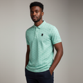 Mint Geometric Jacquard Polo Shirt on Nigerian male model