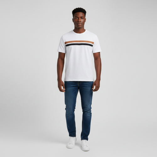 Young Nigerian male wearing white triple stripe chest crew neck tee