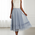 Nigerian model wearing dusty blue bow tulle pleated skirt