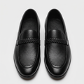 Men's black pebbled leather loafers with braided trim, front view