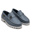 Pair of slate-grey emblem loafers with contrasting light-grey lug soles on white
