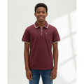 Nigerian teen model wearing burgundy zip collar polo – front view