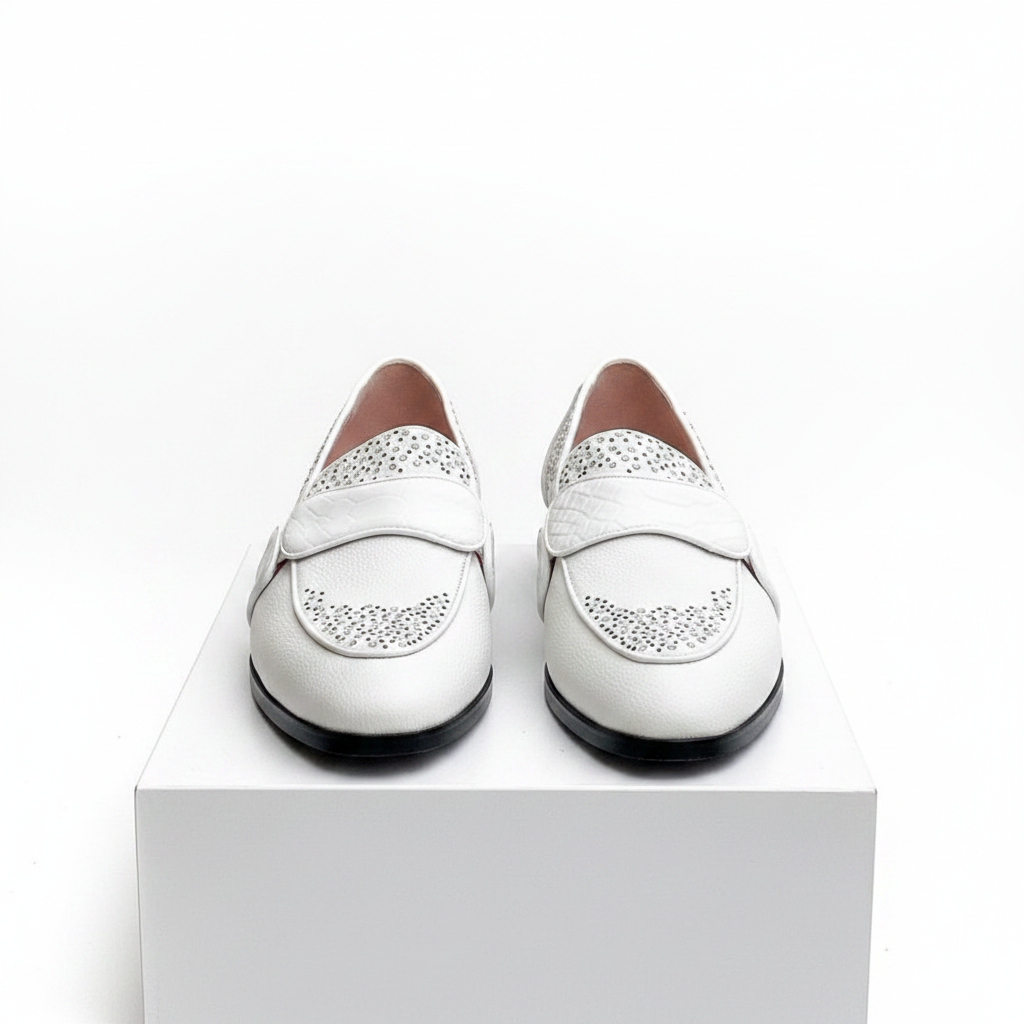Men's white rhinestone embellished penny loafers pair on white platform