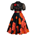 Black and red leaf-print puff-sleeve midi gown on an invisible mannequin