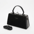 Black structured top-handle handbag with matching detachable strap on a white background