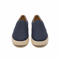 Men's navy blue woven knit slip-on casual sneakers with cream sole pair product shot