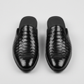 Men's black quilted-texture backless mules with heel, front view