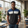 Young Nigerian male model wearing black blue white colour-block polo shirt