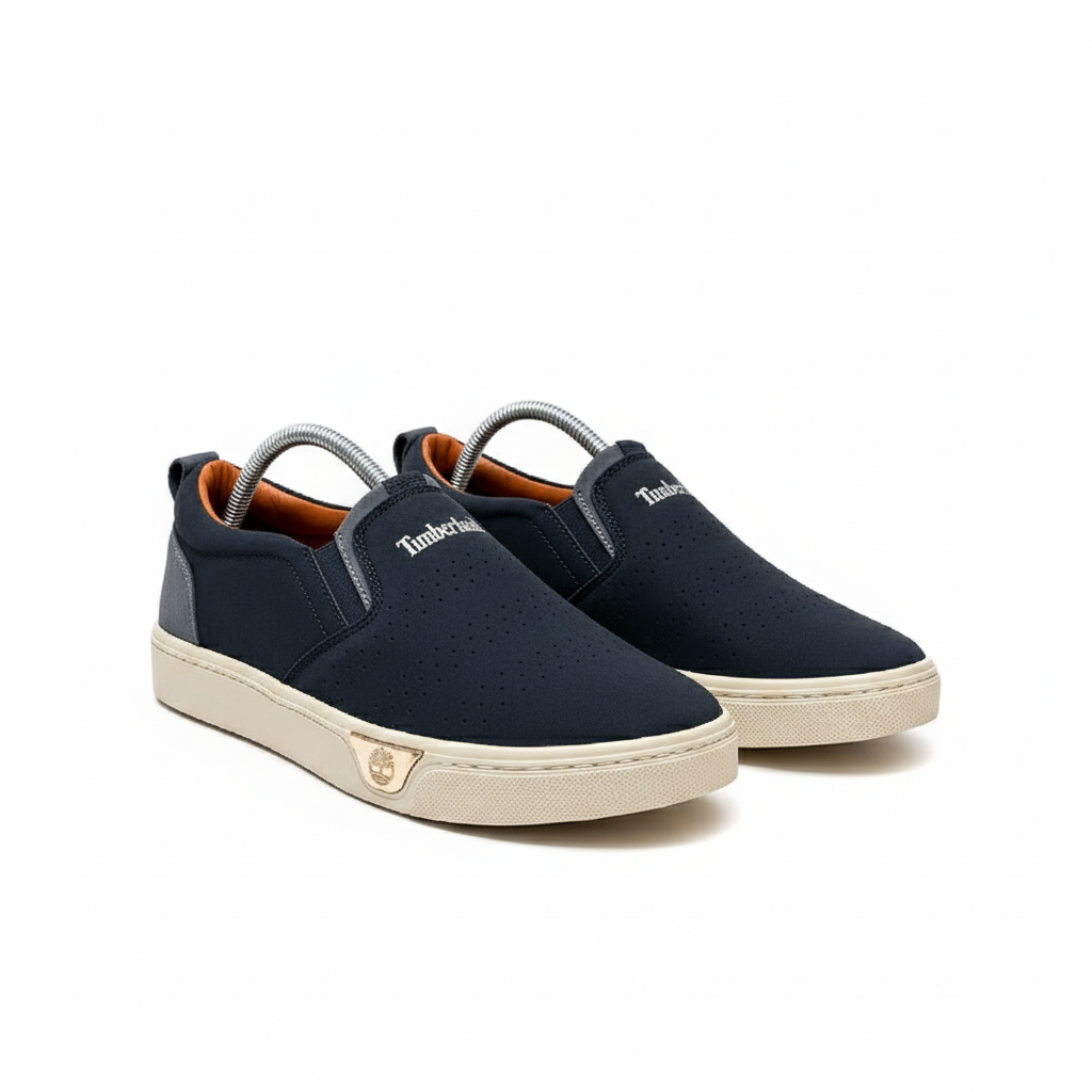 Men's Navy Blue Suede Slip-On Sneaker – Ghost Mannequin Pair Front and Side View