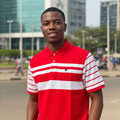 Young Nigerian male model wearing a red and white color block striped polo shirt