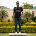 Men's Black & White Contrast Collar Polo Shirt – Nigerian Male Model Shot