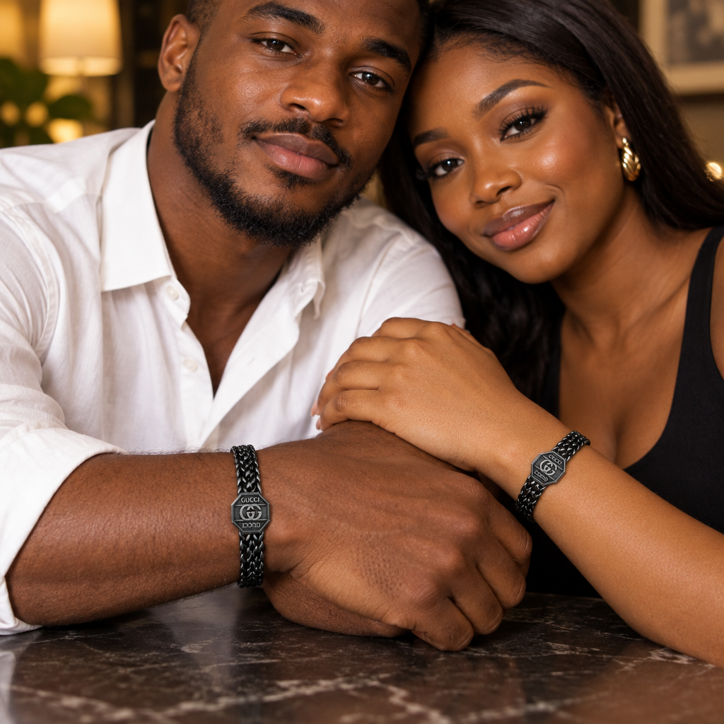 Man and woman each wearing the black braided chain octagon plate bracelet