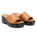 Tan leather silver stud platform wedge slide mule pair ghost mannequin product shot, plain white background