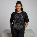 Nigerian female model front view - black rhinestone Minnie Mouse graphic top