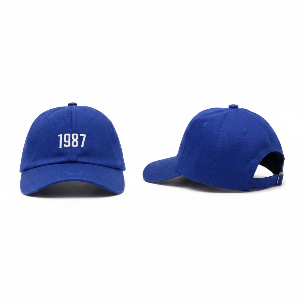 Royal blue baseball cap with white year number embroidery ghost mannequin front and rear-side view