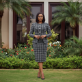 Nigerian female model wearing black and white tweed long sleeve pearl button co-ord set