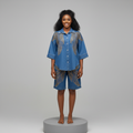 Nigerian female model wearing Blue Denim Rhinestone Pearl Embellished Co-ord Set - front view