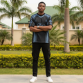 Nigerian male model wearing men's steel blue geometric halftone graphic print shirt