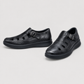 Men's black cutout strap shoes with rounded toe and buckle detail