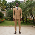 Nigerian male model wearing camel double-breasted peak lapel suit