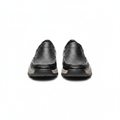 Men's black pebbled leather slip-on loafers with lug sole pair product shot