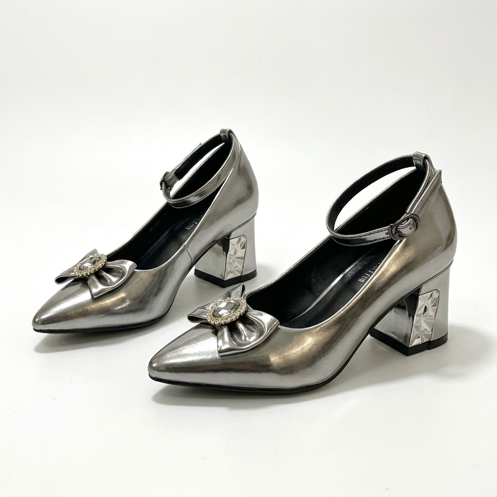 Matching silver jeweled-bow heels standing together side by side