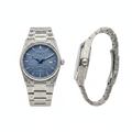 Silver engraved ice blue tapisserie dial dress watch — front and side view