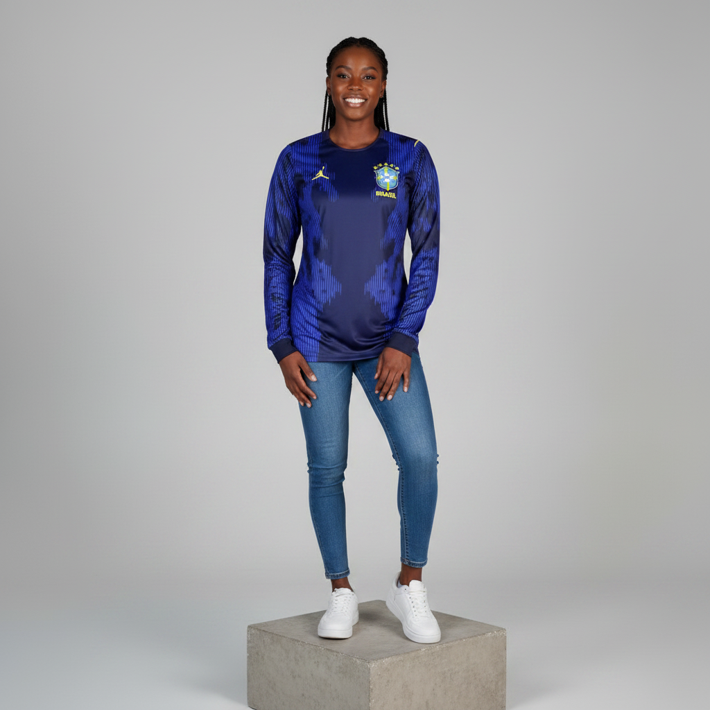 Nigerian female model wearing navy blue pinstripe long sleeve football jersey on concrete plinth