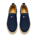 Straight-on navy woven-trim slip-on sneakers with white outsoles