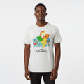 Young Nigerian male wearing vintage cream Pokémon starter squad graphic crew neck tee