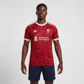 Nigerian male model wearing Liverpool home jersey