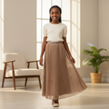 Nigerian girl model wearing beige bow and pearl pleated skirt