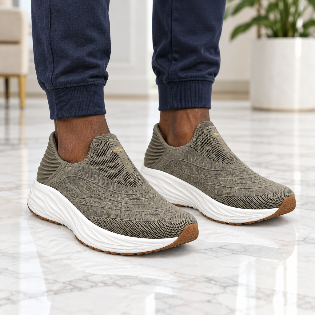 Man wearing taupe knit slip-on walking sneakers