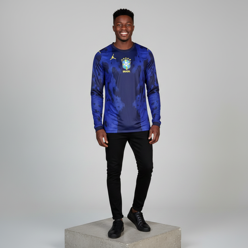 Nigerian male model wearing navy blue pinstripe long sleeve football jersey on concrete plinth