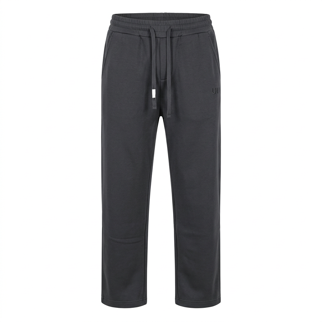 Men’s charcoal grey joggers with matching dark drawstrings and tonal thigh detailing, generated ghost mannequin view