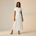 Nigerian girl wearing white pleated midi skirt - front view