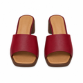 Burgundy block heel slide sandals with a wide single strap and brown stacked heel, full pair shown from the front